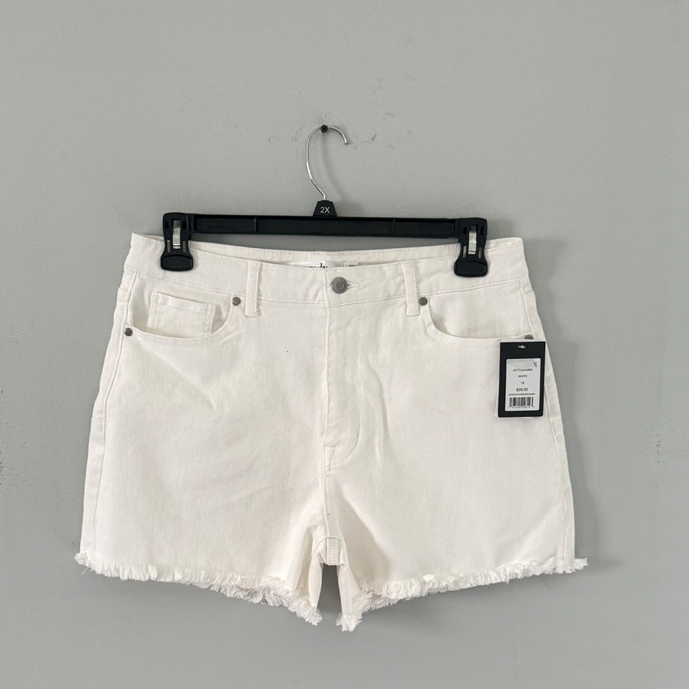 White denim shorts with cut off detail